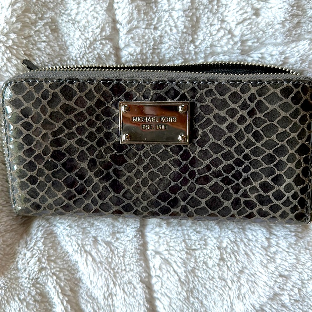Gray snakeskin Michael Kors zipper close wallet with multiple card slots